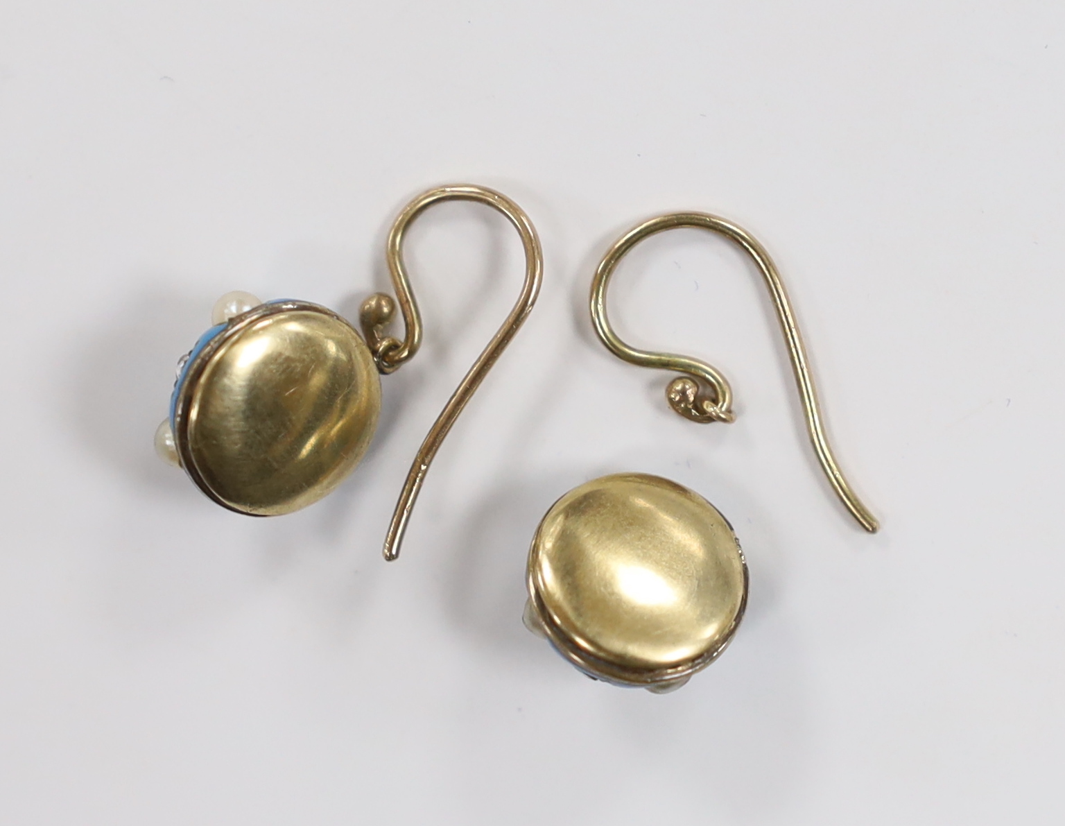 A pair of Victorian yellow metal and blue enamel drop earrings, set with diamond chips and split pearls, boxed, 25mm high